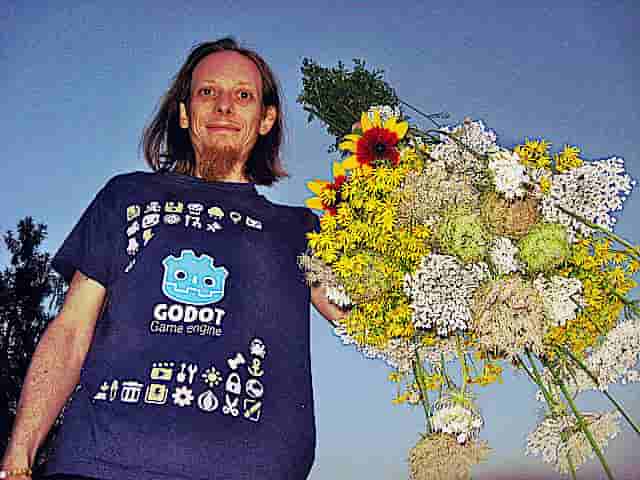 Krzysztof Krystian Jankowski  with flowers
